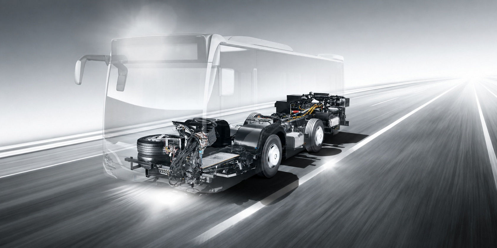 Mercedes-Benz OC 500 RF bus chassis with technical components on the road, shown in the transparent outline of a bus